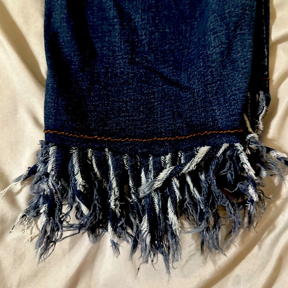 Fashionable jeans with accessorized flare.  Size 16.  I’ve lost weight.